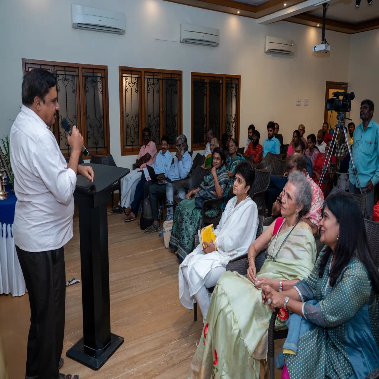 Dr. S. Balusami receiving felicitation citation