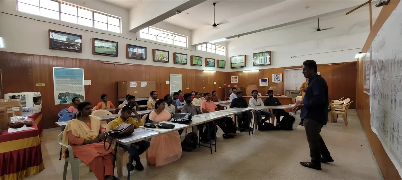 Chithira Koodal Art Exhibit — visitors exploring an exhibition hall